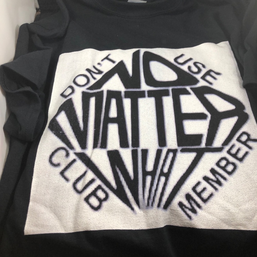 Black tee shirt message